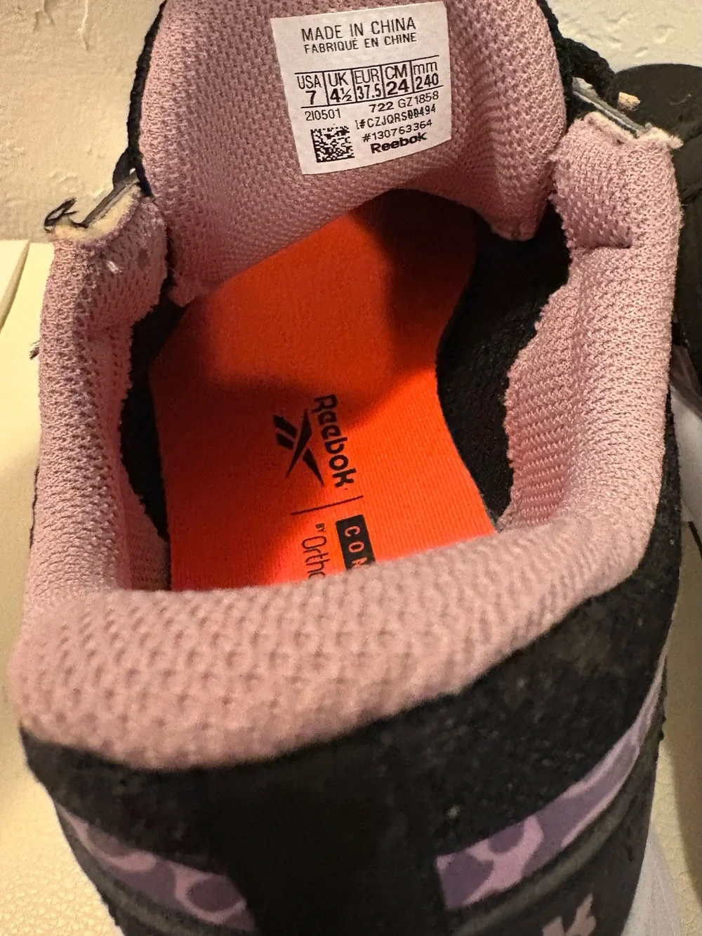 Reebok Black Shoe with Lilac Collar and Orange Insole